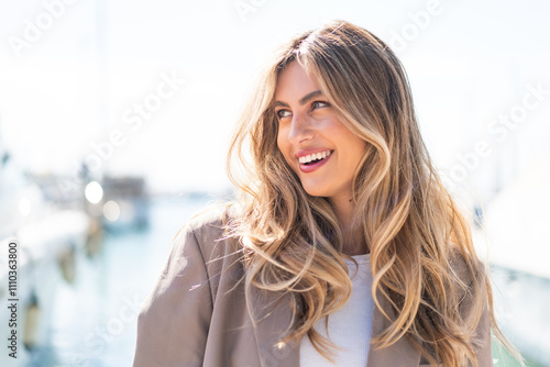 Pretty blonde Uruguayan woman With happy expression