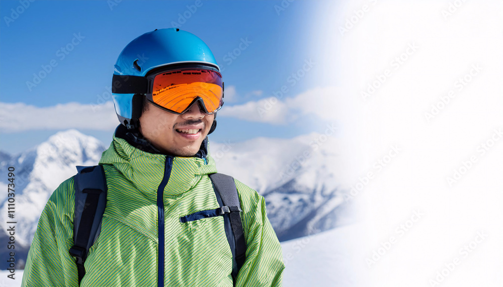 Portrait of a Japanese man wearing ski goggles and a bright winter jacket in a snowy mountain landscape during daytime Portrait of a Japanese man wearing ski goggles and a bright winter jacket in a snowy mountain landscape during daytime