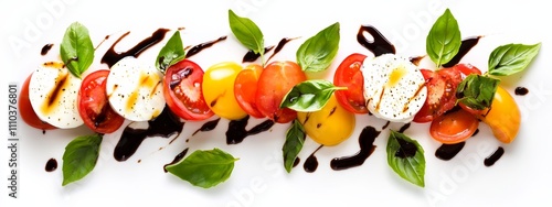 A gourmet caprese salad with fresh mozzarella, heirloom tomatoes, basil leaves photo