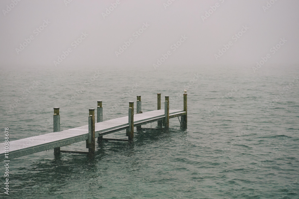 Nature background with covered with snow pier under snowfall Nature background with covered with snow pier under snowfall