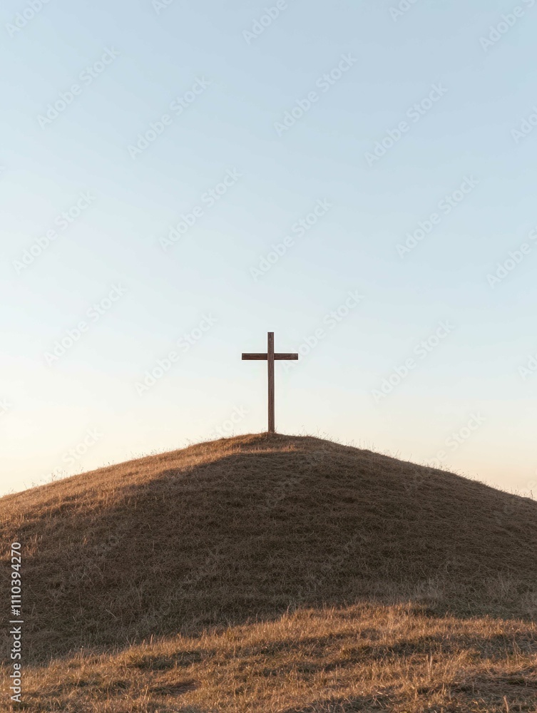 Cross Silhouetted in Golden Sunset

