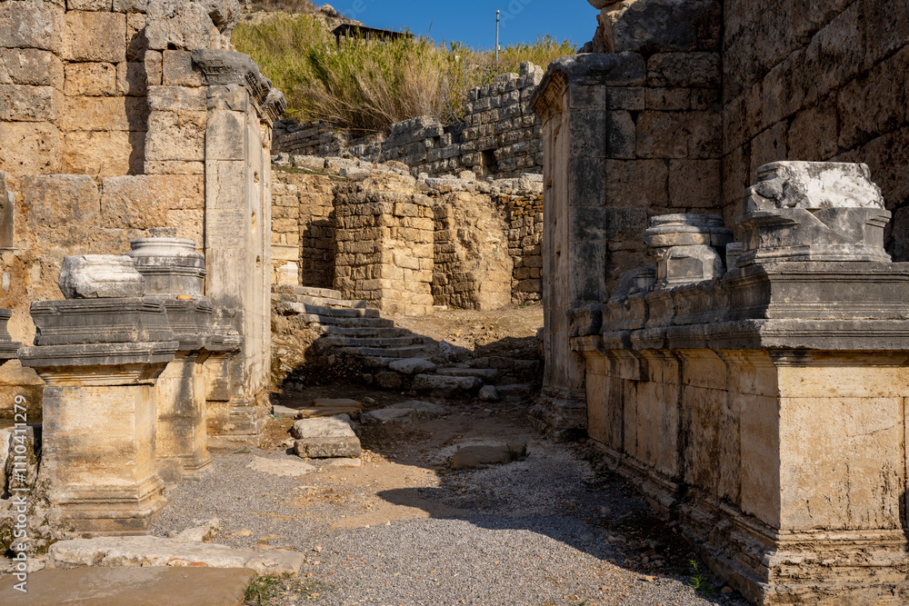 Rows of columns in Perge, Antalya, Turkey. Remains of colonnaded street in Pamphylian ancient city.Rows of columns in Perge, Antalya, Turkey. Ancient Kestros Fountain. Aksu, Antalya