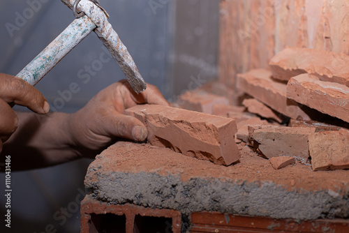 Obraz na płótnie Close-Up of Hands in Masonry Work w salonie