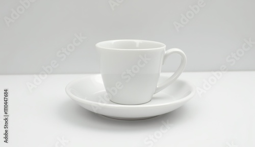 White coffee cup with saucer on a white background, minimalist design