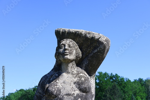 Old sculpture of a woman photo