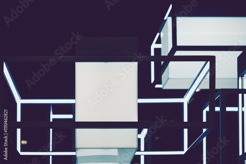 Modern geometric light fixtures create a striking visual display in a contemporary interior design setting