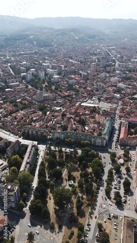 Concept of travel to Europe. An aerial shot of the city of The city of Cacak, Serbia. Vertical shot