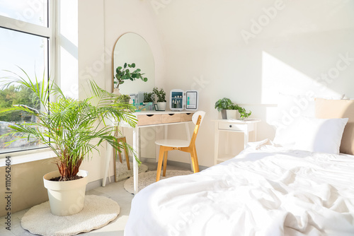 Interior of light bedroom w...