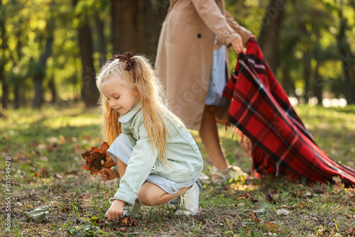 Cute little girl collecting...