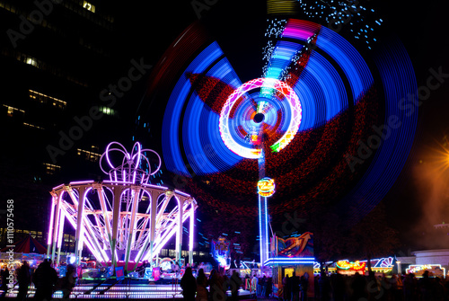 rollercoaster at the Autumn fair at night on Messeplatz