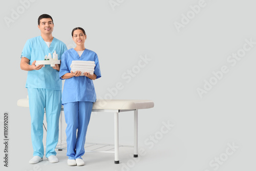 Massage therapists with spa...