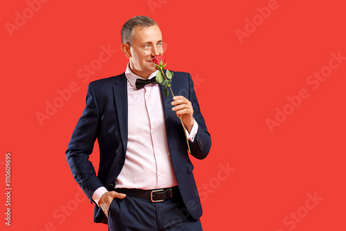 Happy mature man with rose ...