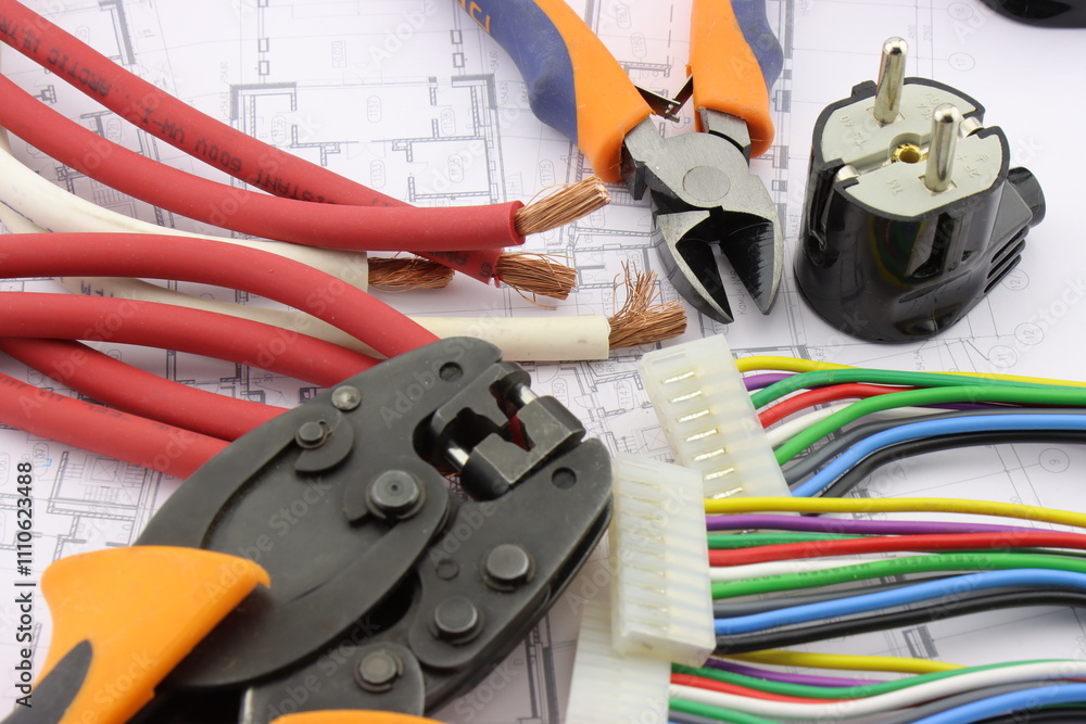 A tool for installing equipment in an electrical switchboard. Soft focus. Close-up. A tool for installing equipment in an electrical switchboard. Soft focus. Close-up.