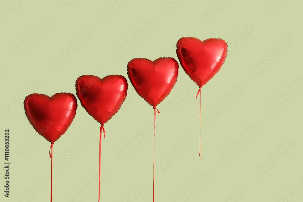 Air balloons in shape of heart on green background. Valentine's Day celebration Air balloons in shape of heart on green background. Valentine's Day celebration