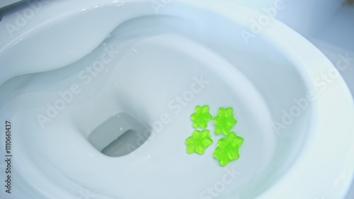 Caucasian Woman Housewife Applying Toilet Bowl Disinfectant Gel and Flushing Water
