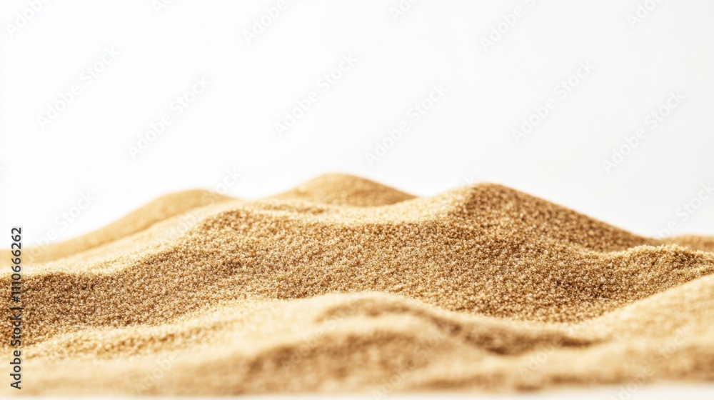 Side view of a smooth sand pile with fine grains and warm tones, sharply contrasted on white. Side view of a smooth sand pile with fine grains and warm tones, sharply contrasted on white.