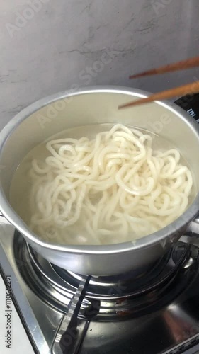 Drain the boiled noodles with a sieve