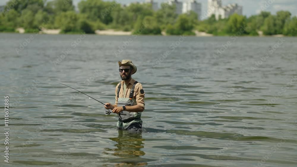 Angler catching fish on light rod Angler catching fish on light rod