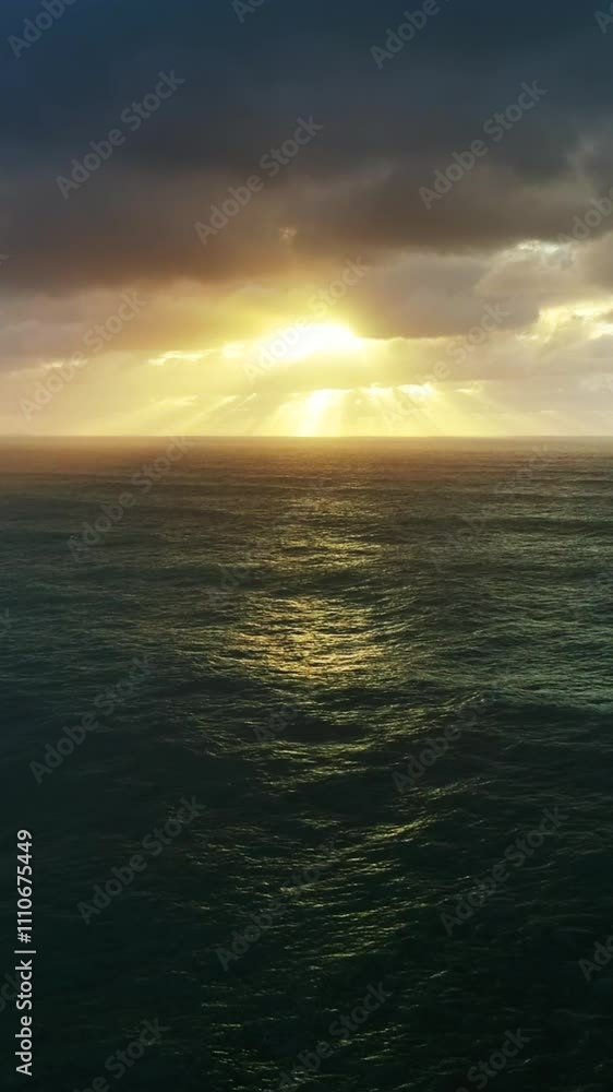 Aerial view on big waves of Atlantic ocean and dramatic sunset sky. Vertical video Aerial view on big waves of Atlantic ocean and dramatic sunset sky. Vertical video
