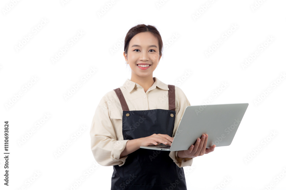 Portrait young asian business woman wearing apron holding laptop computer isolated white background, waitress or barista holding laptop computer with confident, cut out, business or freelance. Portrait young asian business woman wearing apron holding laptop computer isolated white background, waitress or barista holding laptop computer with confident, cut out, business or freelance.