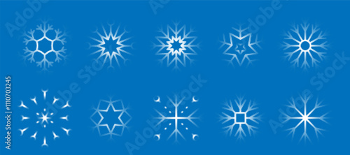 Trendy dotted snowflakes collection. Set of halftone dots elements isolated on blue backdrop