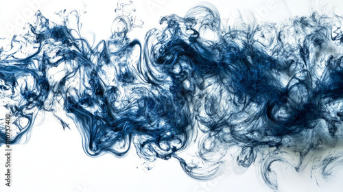 Blue oil paint creating abstract swirls on white background 