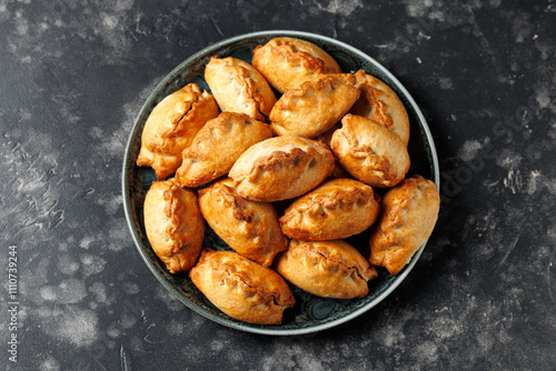 Bild auf Leinwand Crumbly shortcrust mini beef, potato and swede pasties
