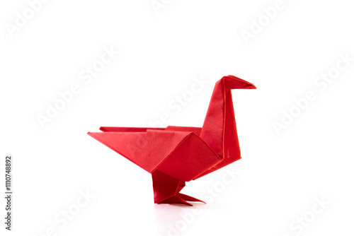 Paper dove on a white background. Origami bird.