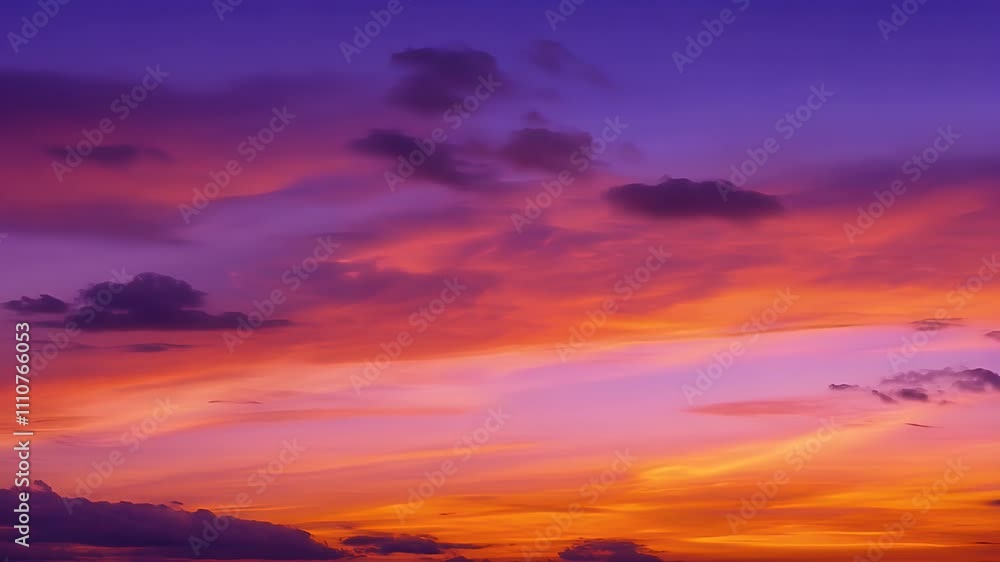 Vibrant sunset sky with colorful clouds in shades of purple, orange, and pink.