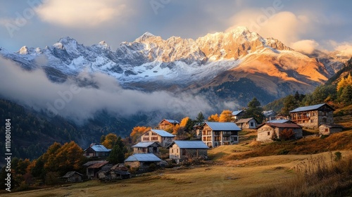 Sunrise over autumnal mountain village.