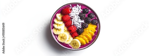 A tropical fruit smoothie bowl with acai, banana, and coconut flakes photo