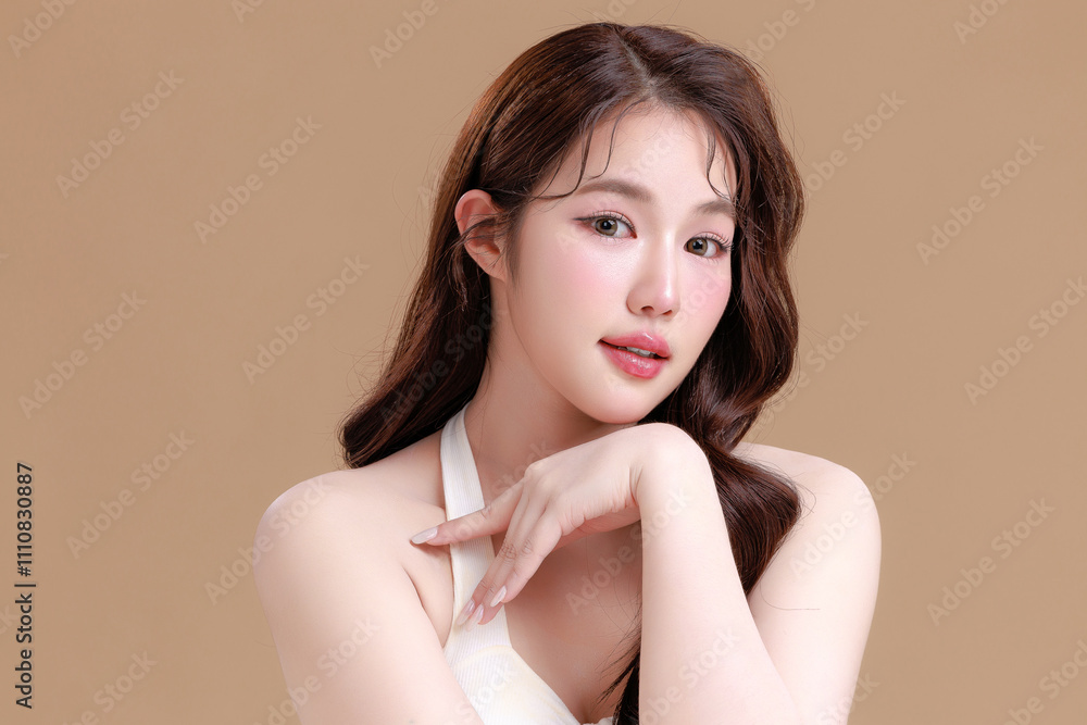 Pretty Asian woman model perfect clear fresh skin smile on isolated beige background. Portrait female beauty blogger make up artist in studio. Skincare, plastic surgery, spa concept. Pretty Asian woman model perfect clear fresh skin smile on isolated beige background. Portrait female beauty blogger make up artist in studio. Skincare, plastic surgery, spa concept.