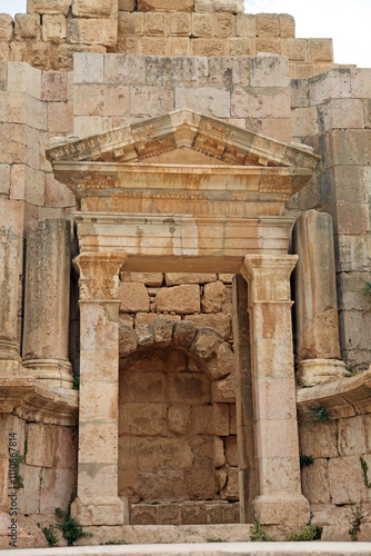 Central doorway on the stage of the south theatre, Jerash Jordan
 photo