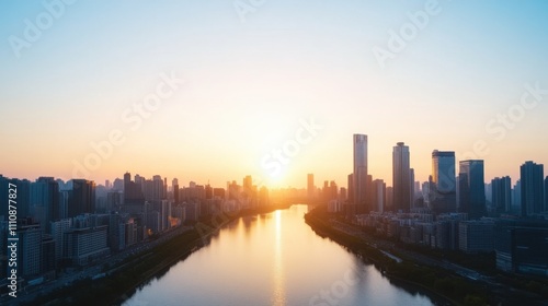 Wallpaper Mural A serene sunrise over a river, framed by modern skyscrapers, creating a beautiful cityscape and tranquil atmosphere. Torontodigital.ca