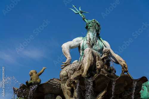 Neptune fountain with Greek god Poseidon from 1891 by Reinhold Begas, Berlin, Germany photo