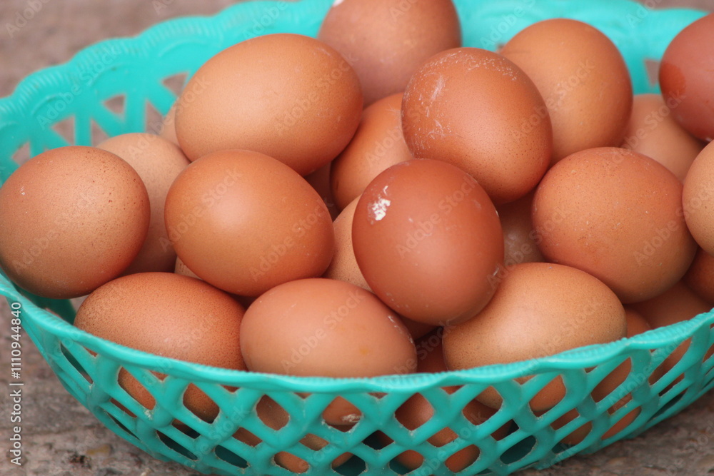 Eggs in a Green Plastic Basket Eggs in a Green Plastic Basket