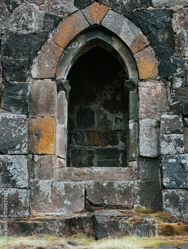 Abandoned Stone Arched Doorway in Rustic Architecture