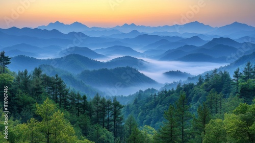 Misty Mountain Ranges at Sunrise: A Breathtaking Landscape of Nature's Beauty