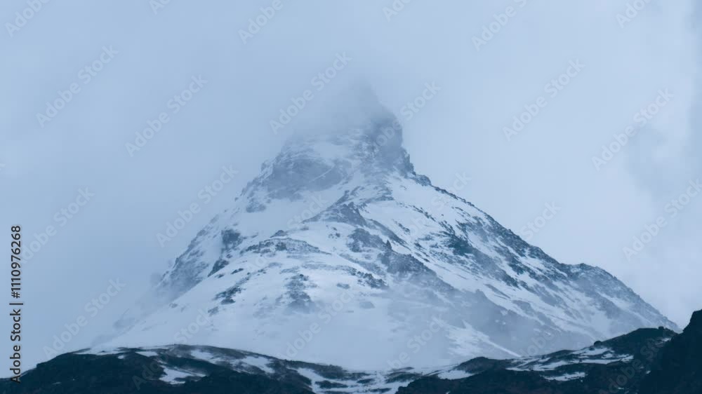 Himalaya mountain peak with clouds time lapse. 4K Timelapse of snowy mountain peak during winter. Travel, holidays and adventure concept. Himalaya mountain peak with clouds time lapse. 4K Timelapse of snowy mountain peak during winter. Travel, holidays and adventure concept.