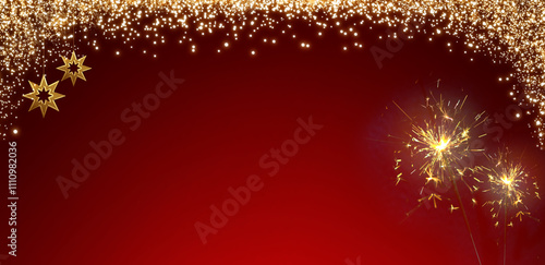 Christmas sparkler lights on red background.