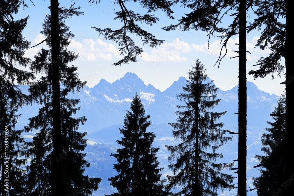 Majestic Mountain Range Silhouetted by Pine Trees - A Breathtaking Alpine Landscape Majestic Mountain Range Silhouetted by Pine Trees - A Breathtaking Alpine Landscape