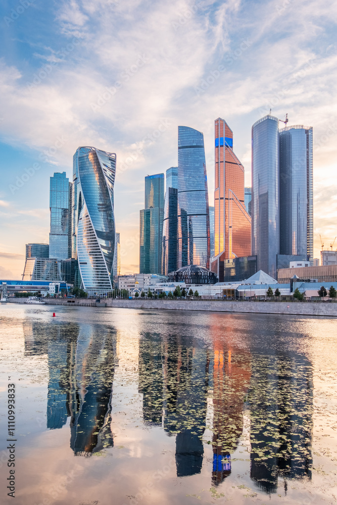 Obraz premium High buildings of Moscow-City at Moskva River at summer sunset, Russia.