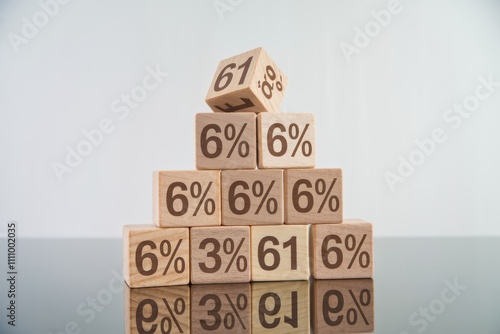 Wooden blocks stacked in a pyramid with percentages showing growth.