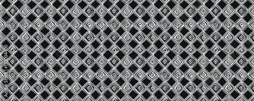 Intricate diamond pattern texture, a repeating geometric design with a metallic, industrial feel.