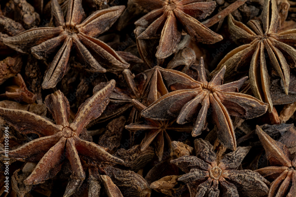 Close-up view of anise stars as background texture. Close-up view of anise stars as background texture.
