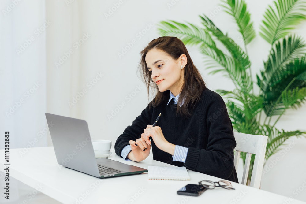 Business woman learning online laptop in office at desk Business woman learning online laptop in office at desk