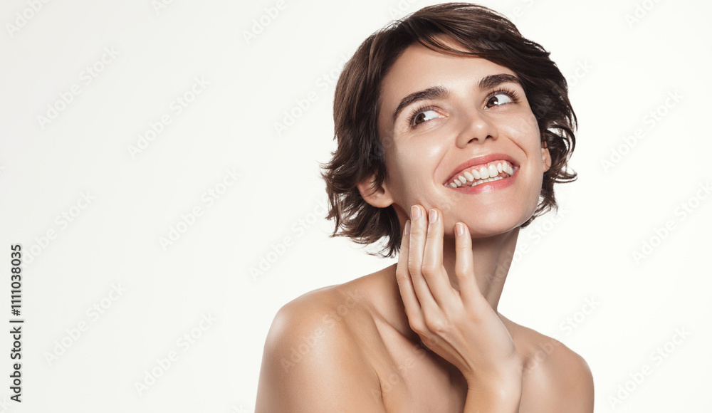 Fresh and Clean Look of Woman with Dewy Skin, Touching cheek and Smiling, Pleased with hydrated and Moisturised effect after cleansing gel treatment, hyaluronic acid serum, white background Fresh and Clean Look of Woman with Dewy Skin, Touching cheek and Smiling, Pleased with hydrated and Moisturised effect after cleansing gel treatment, hyaluronic acid serum, white background