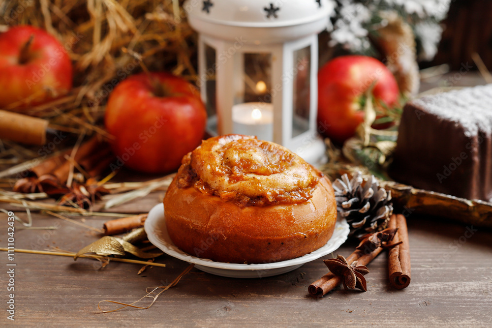 Fototapeta premium Sweet bun with cinnamon and apple.