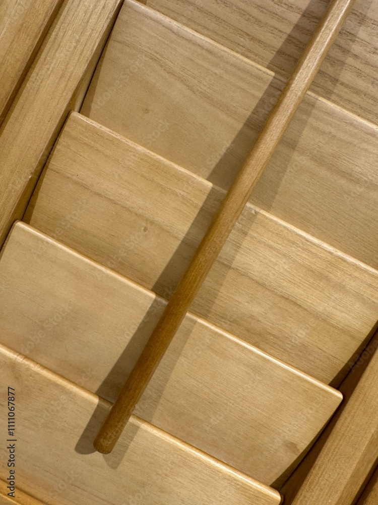Angled full frame image of wooden plantation shutters Angled full frame image of wooden plantation shutters