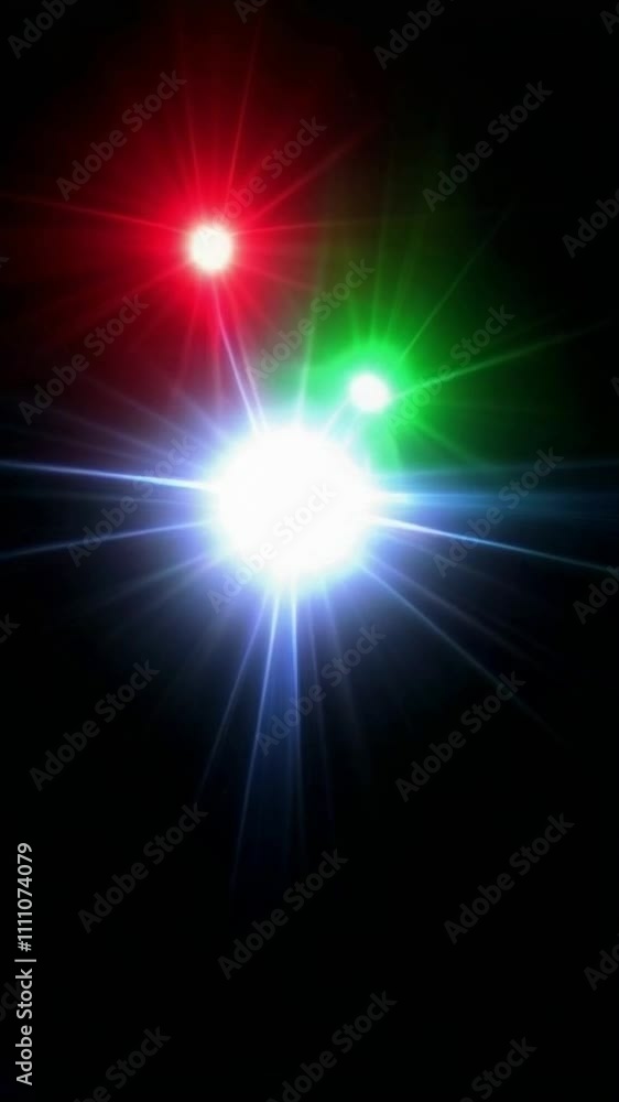 Abstract animation of vibrant red, green, and blue spheres spinning on a black background. Abstract animation of vibrant red, green, and blue spheres spinning on a black background.